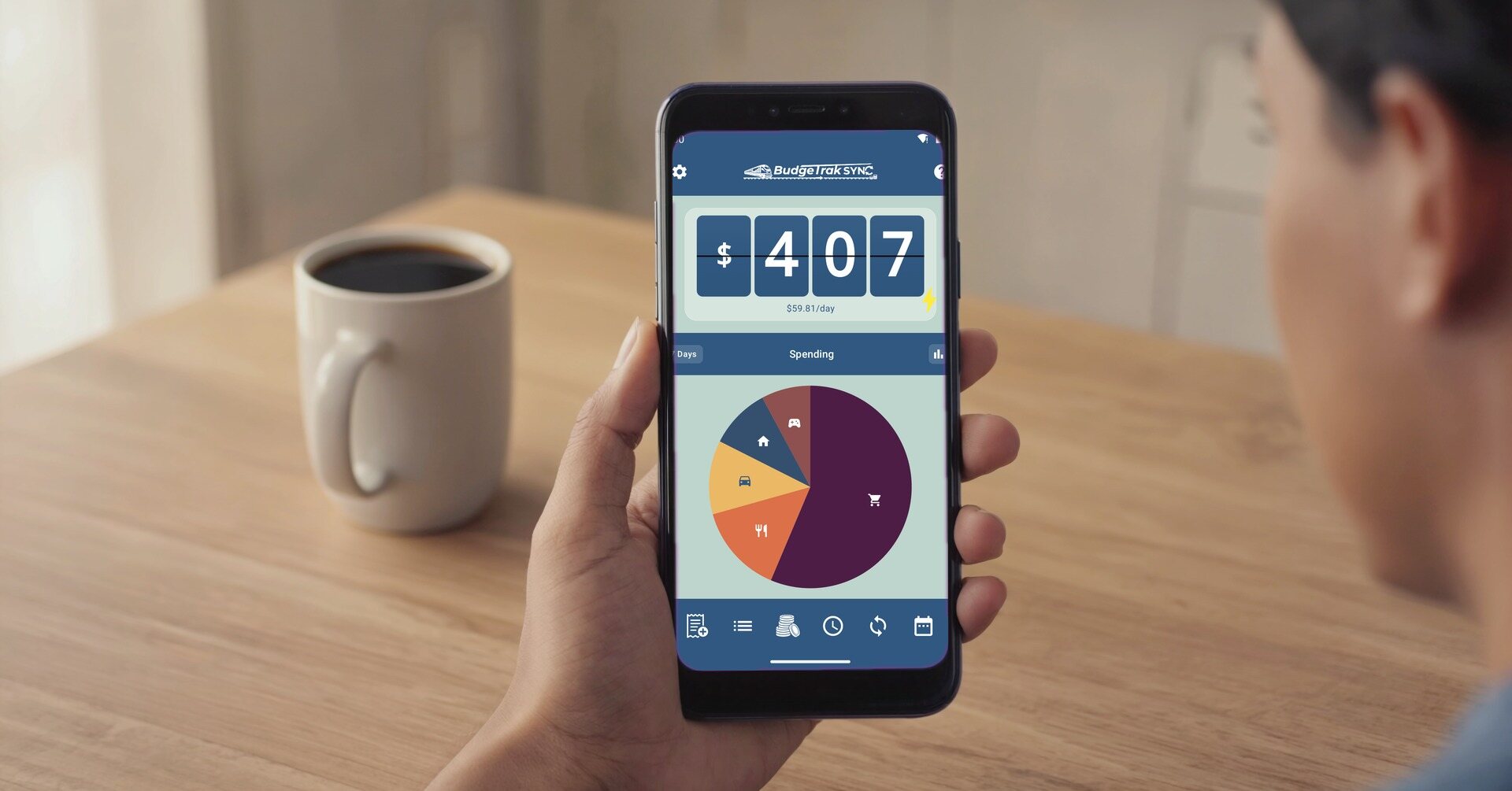 The BudgeTrak dashboard showing available cash and the safe daily spending amount